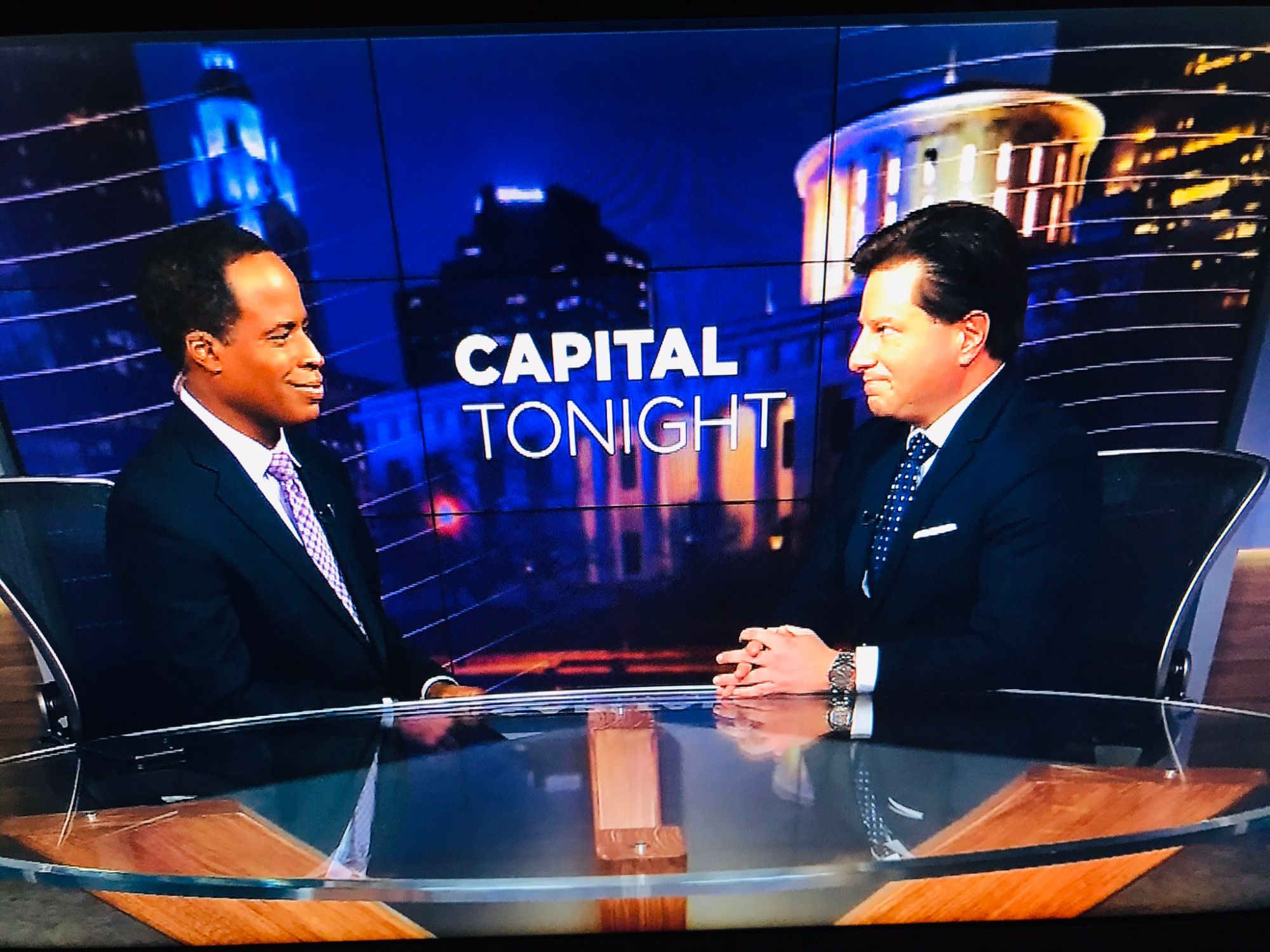 Brian Calfano being interviewed on Capital Tonight