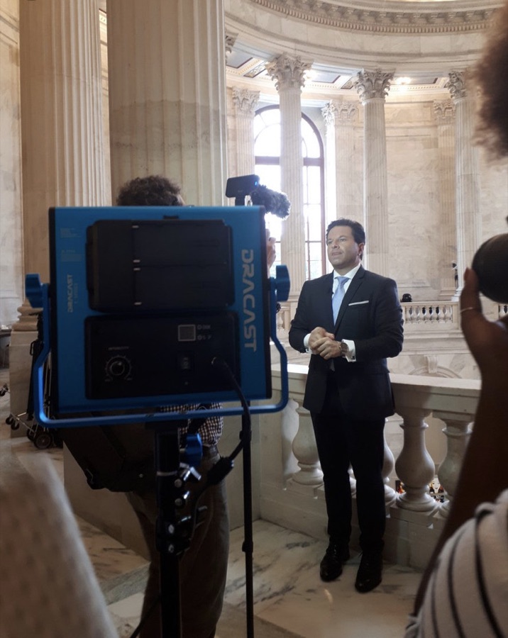 Brian Calfano and a camera crew preparing to tape in the Senate Rotunda